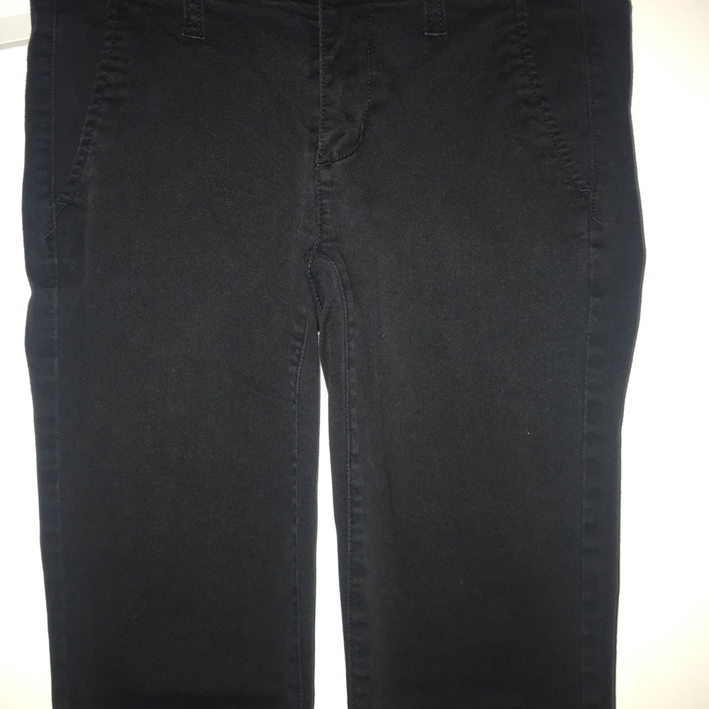 Black Americann Eagle pants.